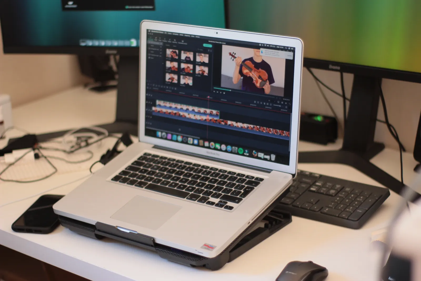 Real laptop editing workspace representing image compression, visual quality review, and export workflow