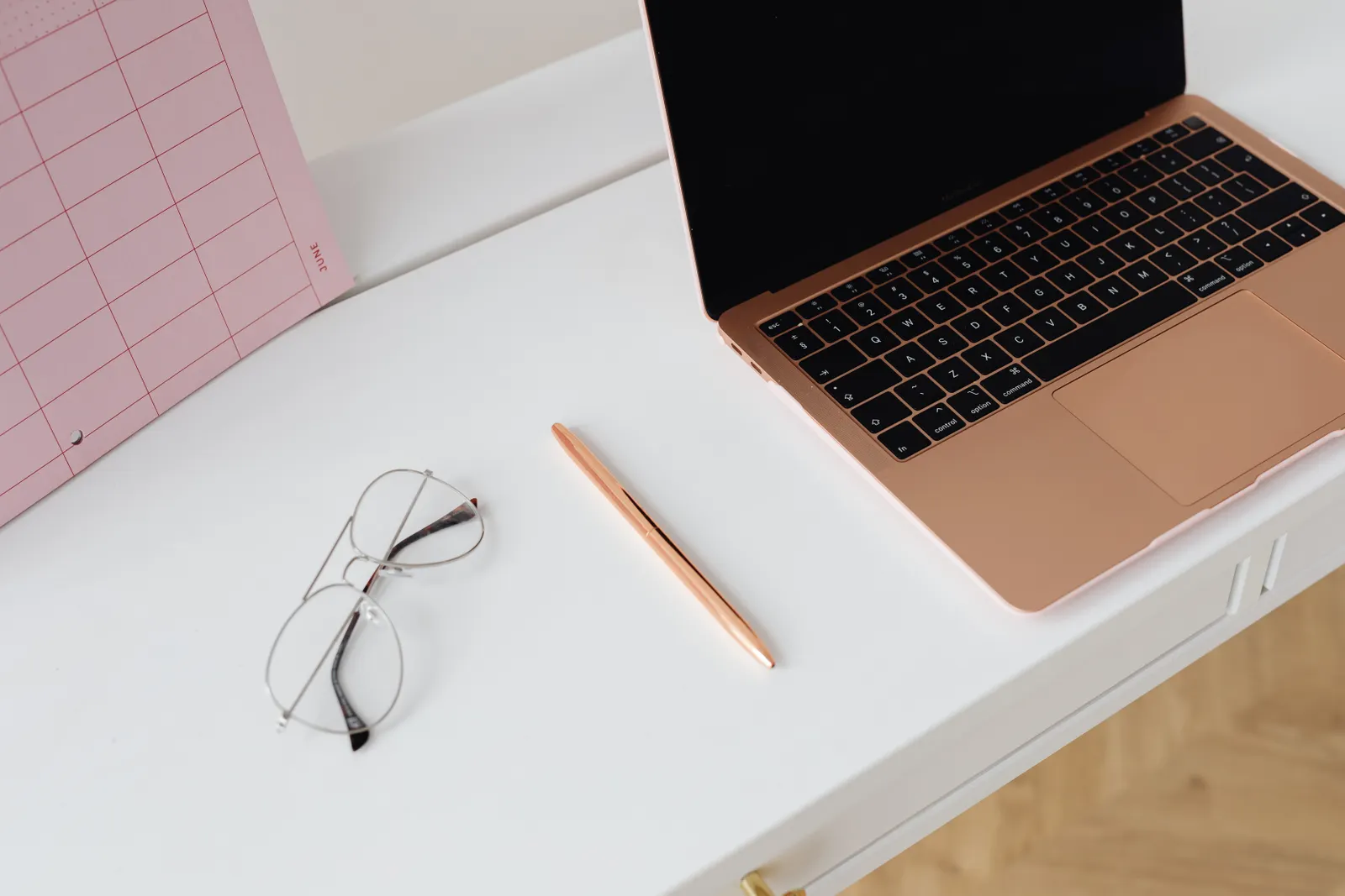 Real organized laptop workspace representing Claude as an AI coworker for documents, planning, and productivity